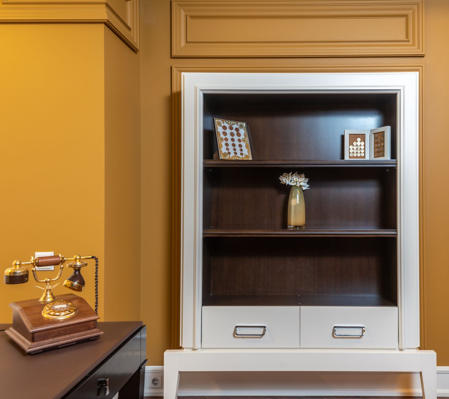 A dark antique cabinet in a shadowy bookshop room, evoking surrealist horror dream fiction novels UK 2026