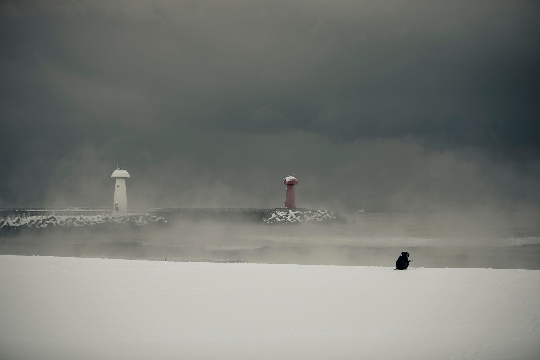 A fog-bound Scottish lighthouse at night, evoking the atmosphere of maritime horror novels